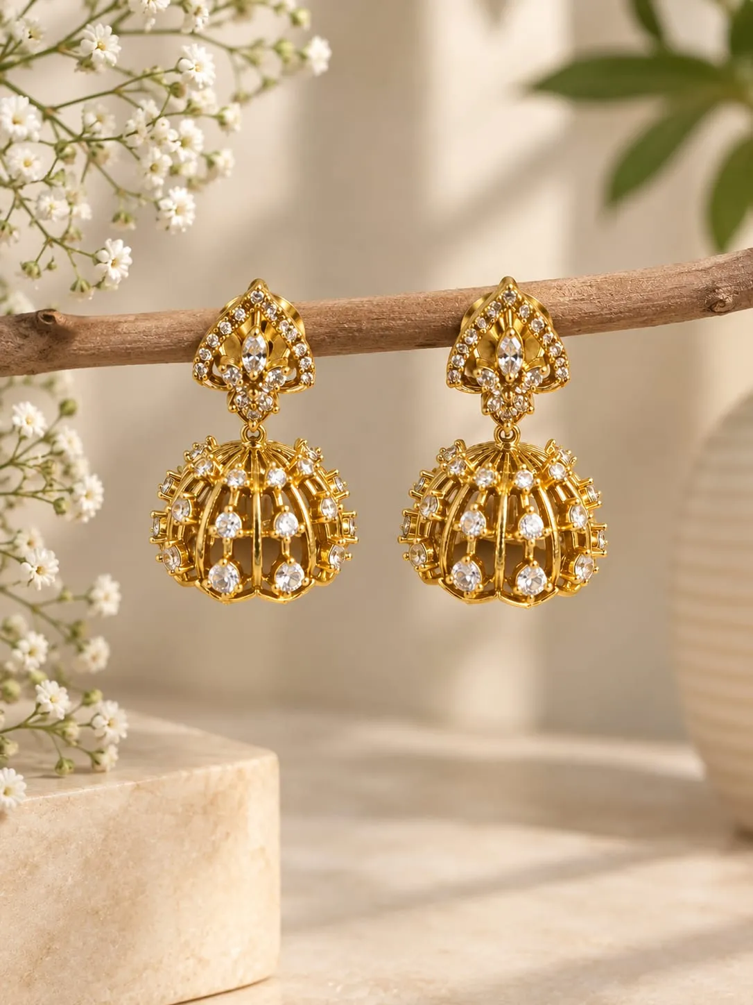 Celestia Cage Jhumka Earrings — Gold finish with intricate detailing, Cubic zirconia (CZ) clear stones