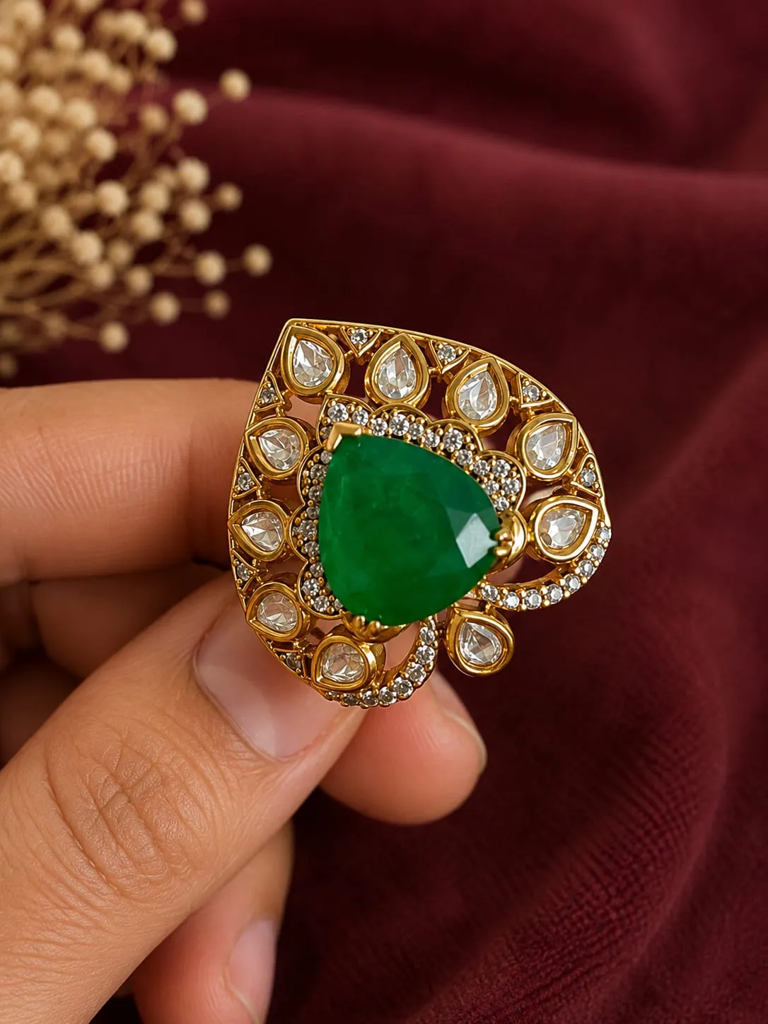 Emerald Teardrop Statement Ring — Gold finish with intricate teardrop detailing, Cubic Zirconia (CZ) and green emerald-inspired centre stone