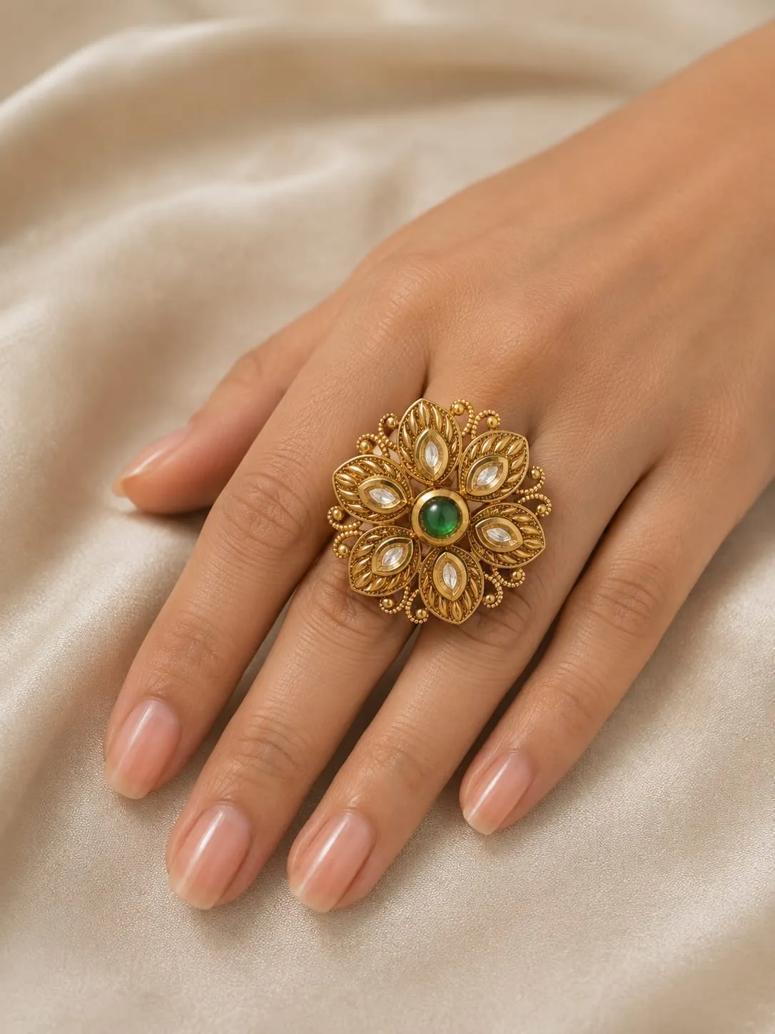 Floral Green Stone Statement Ring — Antique gold finish with intricate floral detailing, Cubic Zirconia (CZ) and green emerald-inspired centre stone