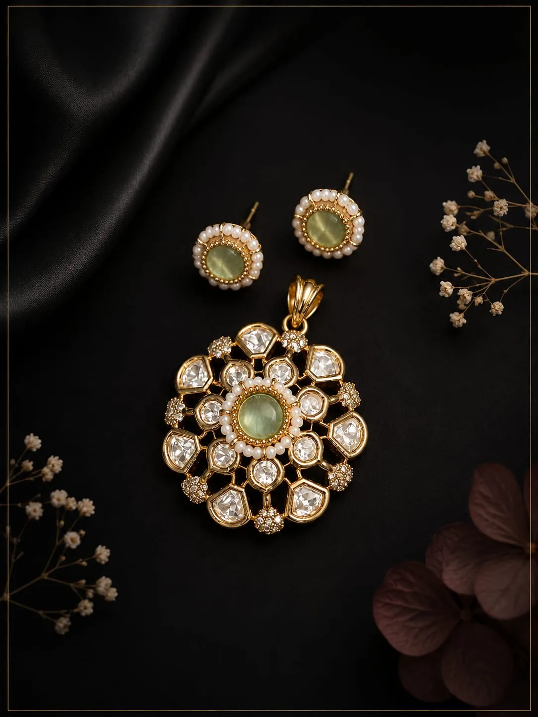 Green Bloom Pendant Set — Gold finish with intricate detailing, Cubic Zirconia (CZ) and pearl-style detailing and green centre stone