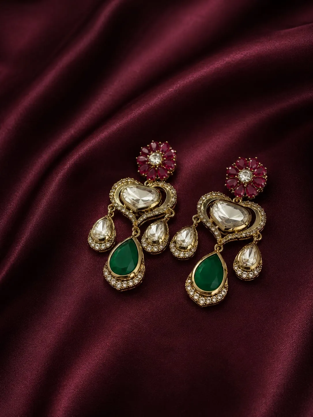 Kundan Heart Shaped Earring — Gold finish with intricate detailing, Kundan-style stones and CZ stones and green stones and red stones