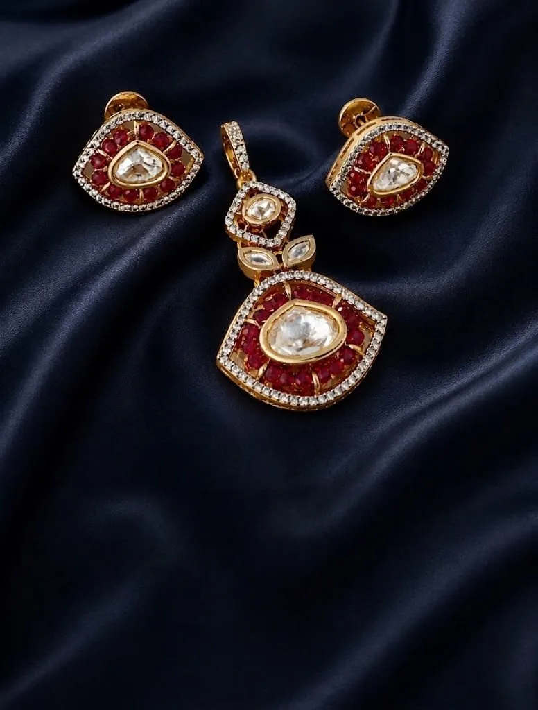 Kundan Pendant Set — Antique gold finish with traditional oxidised work, Kundan-style stones and red synthetic stones and CZ stones