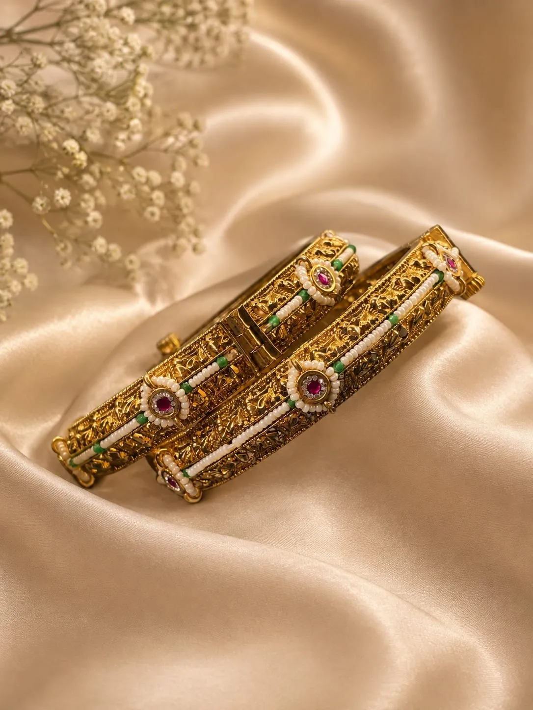 Rajwadi Shahi Kundan Bangles — Gold finish with intricate detailing, Kundan-style clear stones and red and green stones and pearl-style detailing
