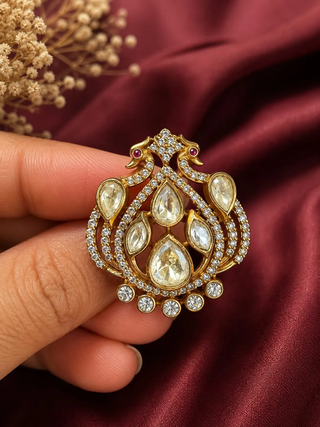 Royal Teardrop Crystal Ring — Gold finish with intricate openwork detailing, CZ stones and red synthetic stones