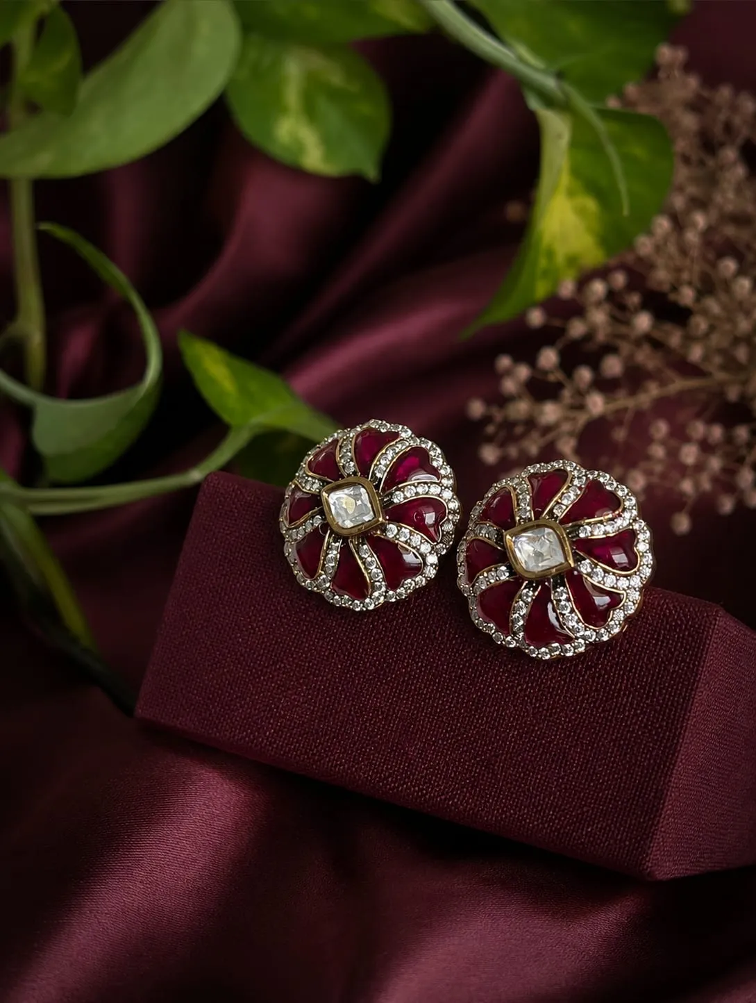 Ruby Floral Earrings — Gold finish with floral detailing, Red stones and CZ stones